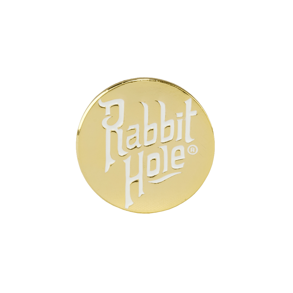 https://www.rabbitholedistillery.com/cdn/shop/products/gold-logo-enamel-pin-786230_1200x.png?v=1680136584
