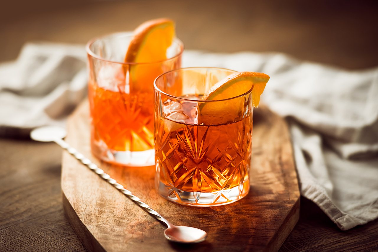 Bourbon with one big ice cube - only way to go.